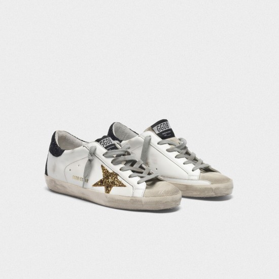 Women's Golden Goose superstar sneakers with gold star and glittery black